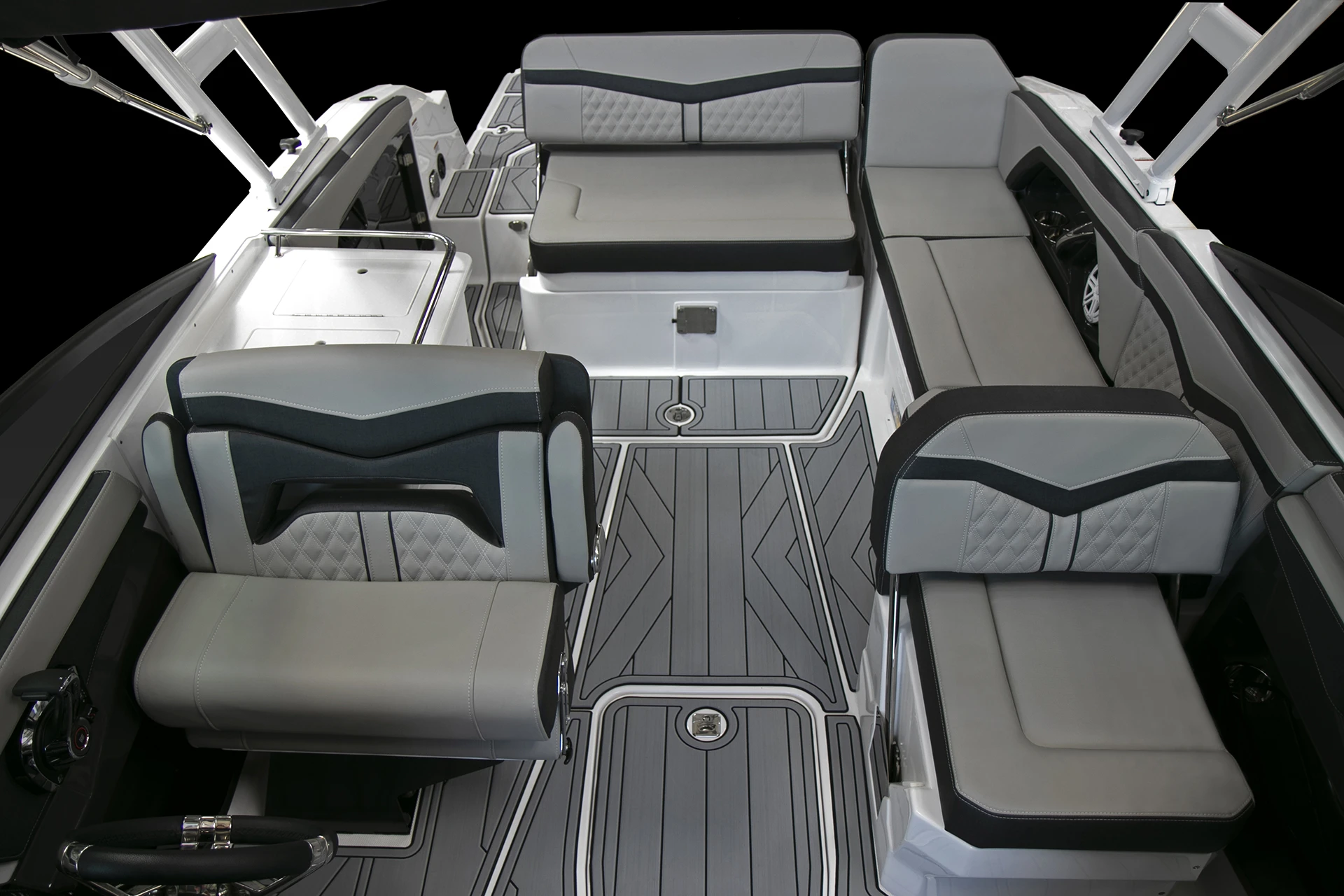 Wide interior view of the Monterey 258SS cockpit showing wraparound seating and non-skid flooring
