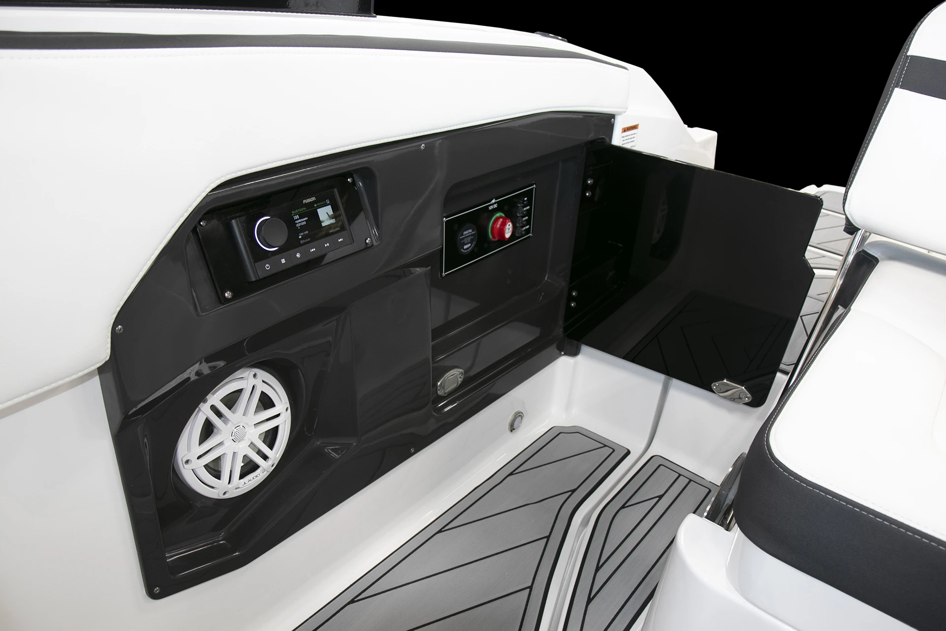 Starboard side storage and power control panel with access to battery switches and additional electrical components