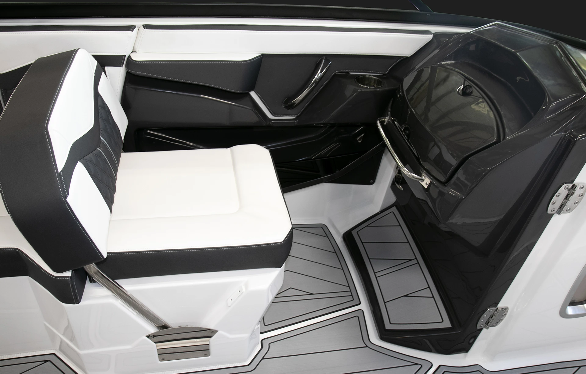 Passenger-side helm seat with integrated storage and glove box, finished in premium two-tone upholstery