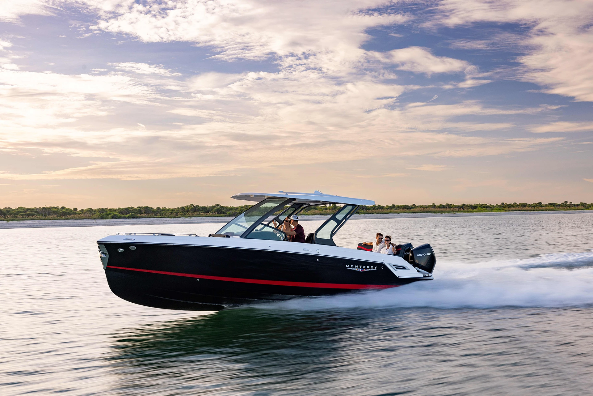 Wide shot of the Elite 30 OB in motion, highlighting the stylish lines and spacious cockpit seatin