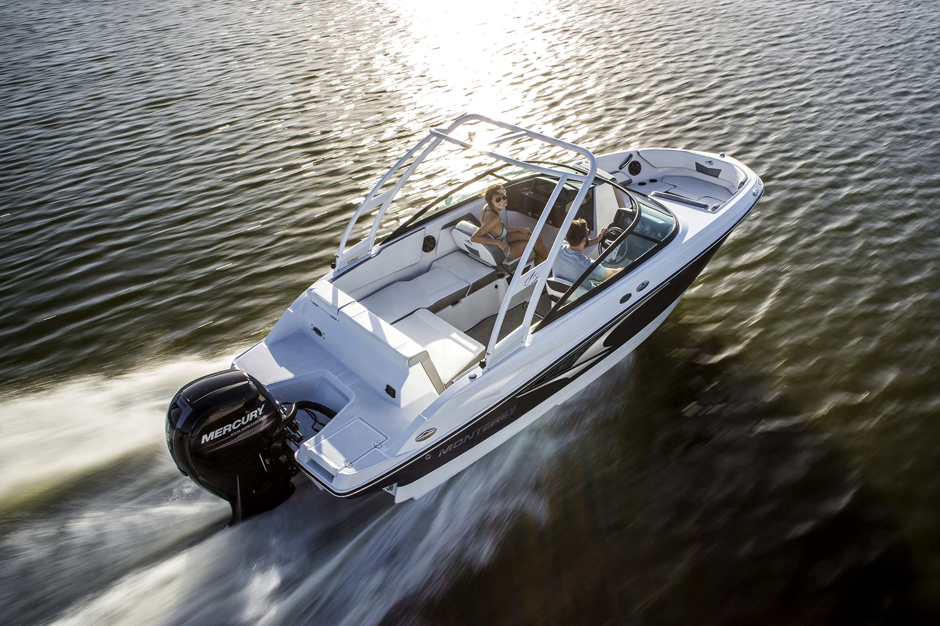 Overhead view of a Monterey M-205 cruising at speed on the water
