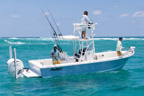 Parker 240 Coastal Elite with tower fishing in clear offshore water
