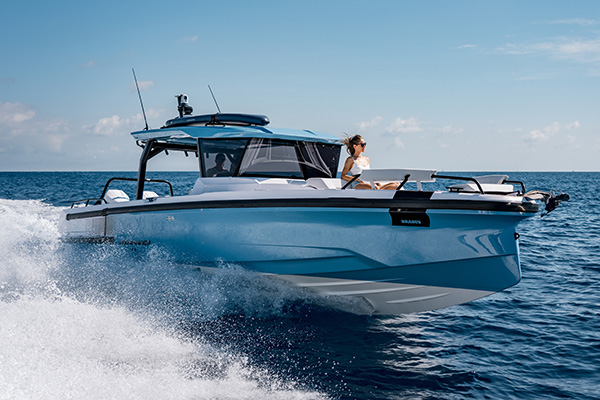 Axopar 38 Cross Top cruising at speed with wraparound windshield